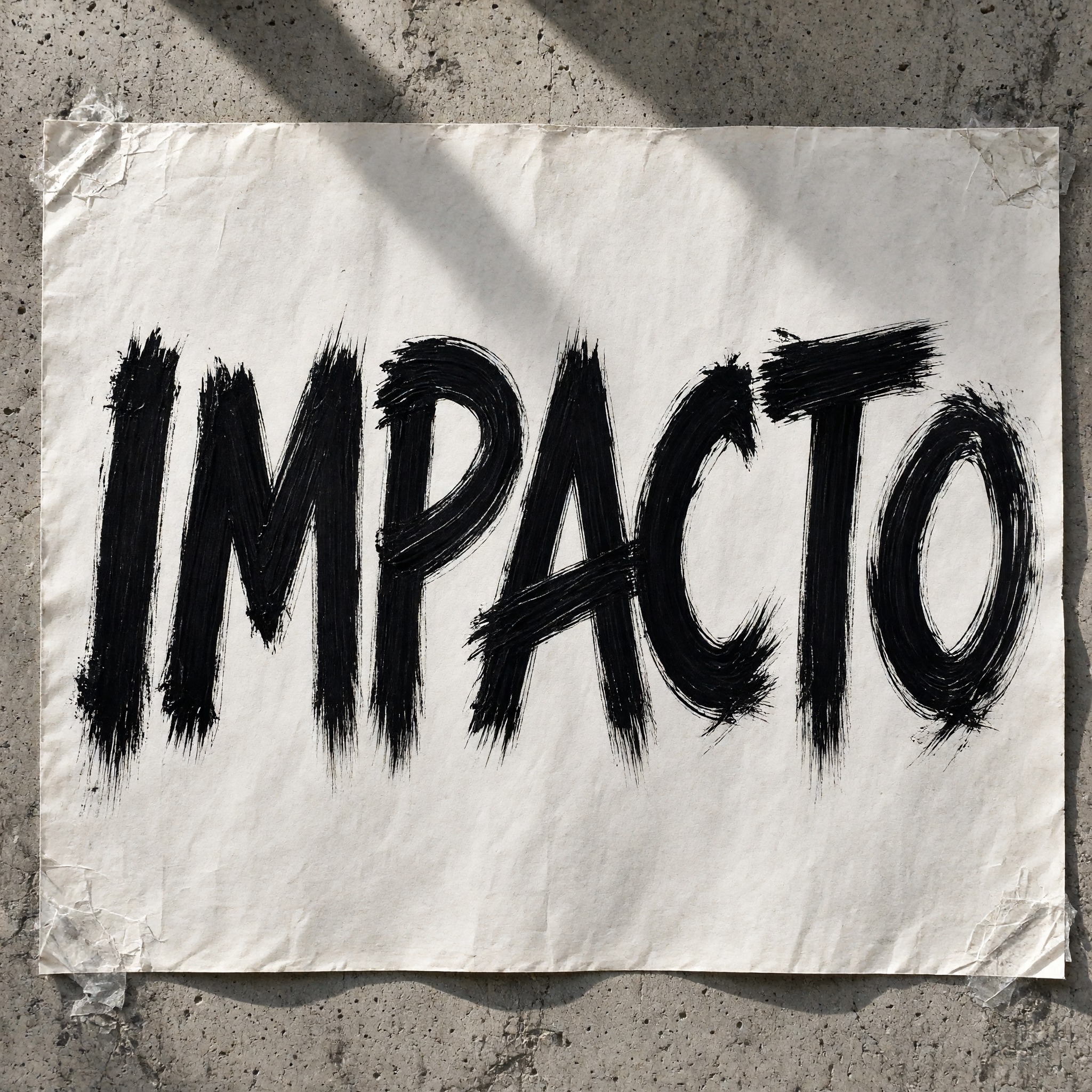Fuente de IA Letras de pincelada generada con Grok Imagine: la palabra IMPACTO