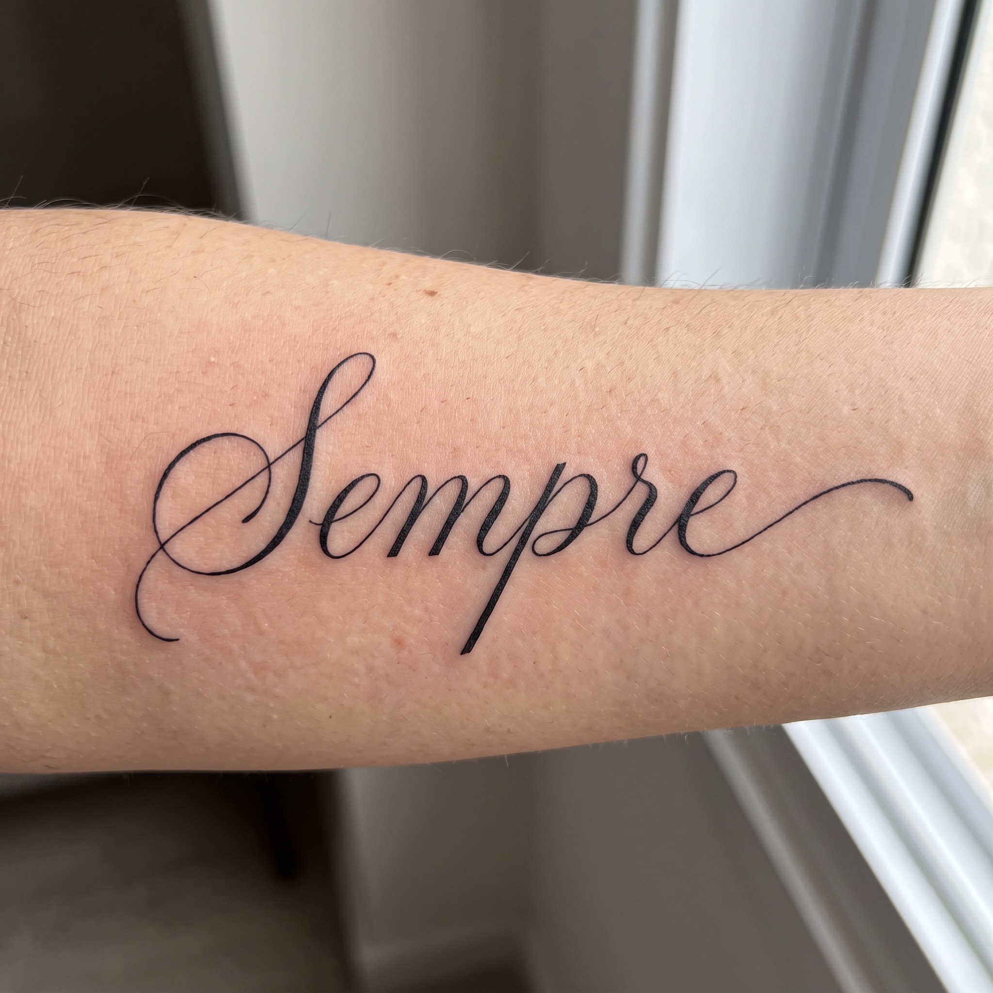 Fonte de IA Letra cursiva para tatuagem gerada no Nano Banana: a palavra Sempre