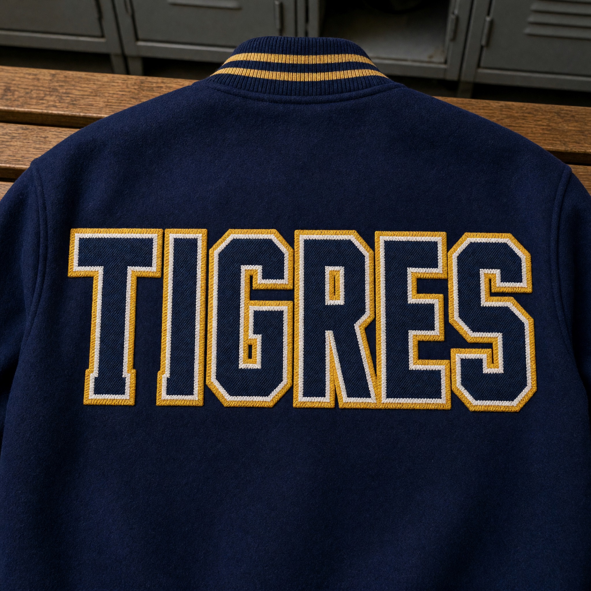 Fuente de IA Letra varsity generada con Grok Imagine: la palabra TIGRES